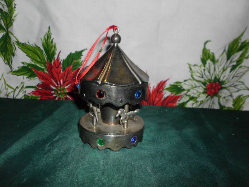 lot 27 image: BRASS CAROUSEL