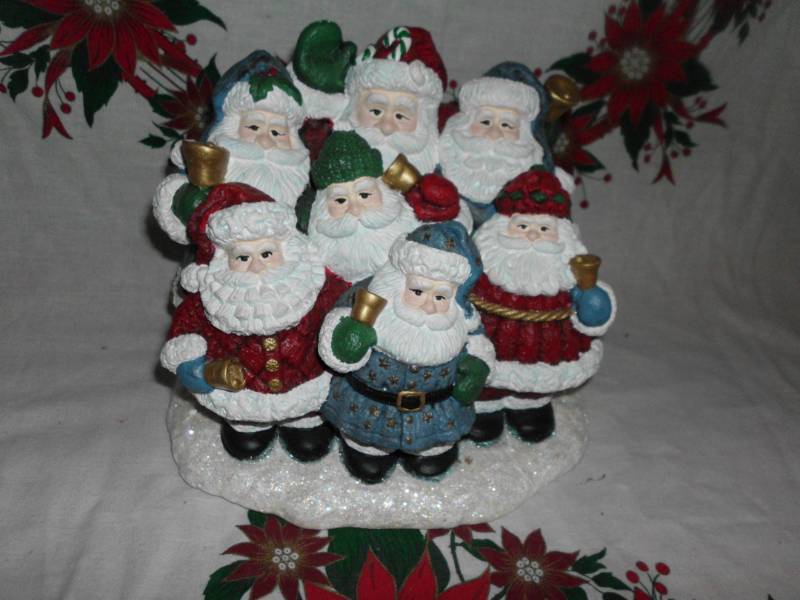 lot 147 image: CAROLING SANTA FIGURINE