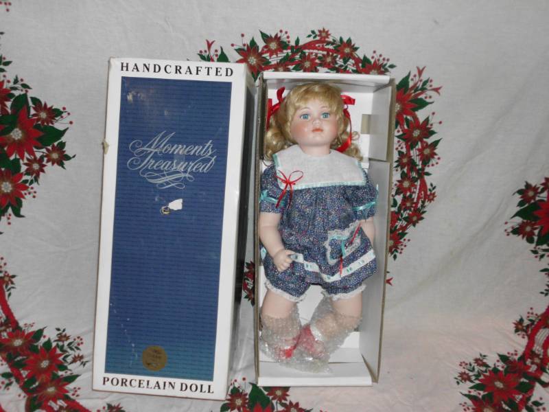 lot 234 image: PORCELAIN DOLL