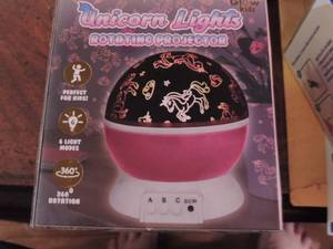 lot 55 image: UNICORN LIGHTS  ROTATING PROJECTOR
