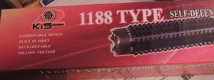 lot 71 image: KENTUCKEY  SUPPLY  MODEL 1188, Rechargeable 19 baton style stun gun and light   5.4M VOLT  NEW