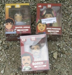 lot 95 image: You Looz vinyl figurines never opened   QTY 3