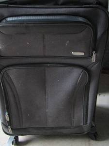 lot 11 image: BLACKSUIT CASE