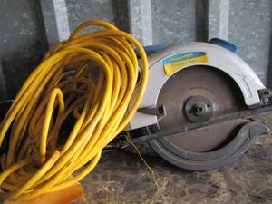 lot 48 image: yellow extension cord , project pro circular saw