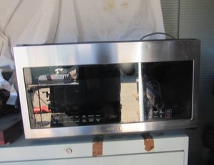 lot 74 image: SAMSUNG OVER HEAD MOUNTED MICROWAVE