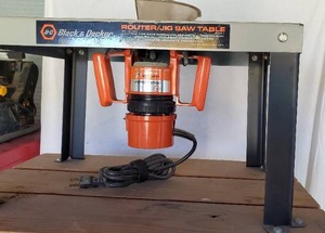 lot 19 image: BLACK AND DECKER ROUTER JIG SAW TABLE MOUNTED BD ROUTER