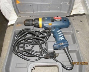 lot 46 image: RYOBI CORDED DRILL IN CASE