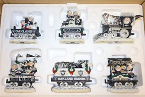 lot 24 image: Oakland Raiders Christmas train figurines - Christmas Express