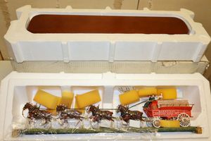 lot 29 image: Budweiser Clydesdales figurine and Aluminum Beer Bottle collectibles (not for consuming)