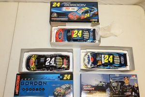 lot 42 image: Jeff Gordon 124 scale stock cars - 3 total still in packaging