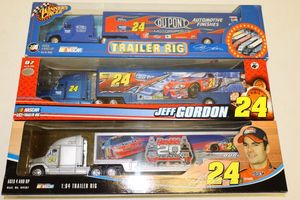 lot 45 image: Jeff Gordon 164 scale Trailer rigs - 3 total still in packaging