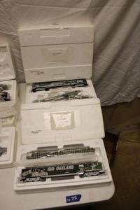 lot 75 image: Oakland Raiders model train cars and track Go Oakland and Offensive Power rail cars