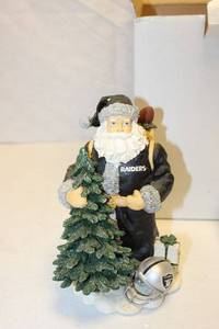 lot 79 image: Oakland Raiders Santa figurine