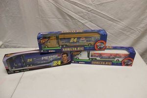 lot 86 image: Jeff Gordon model trailer rigs - 3 total