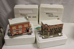 lot 92 image: Oakland Raiders Christmas village buildings health club and hardware store