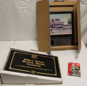 lot 104 image: Oakland Raiders coliseum plaque, antenna helmet and empty ticket album