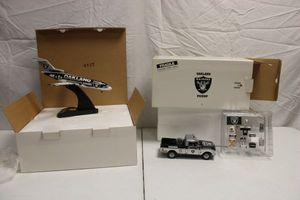 lot 106 image: Oakland Raiders model team plane and  truck