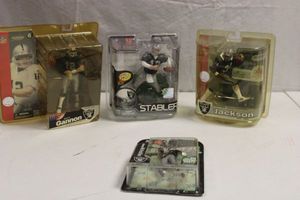 lot 107 image: Oakland Raiders figurines Gannon, Stabler, Jackson, McFadden
