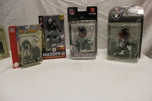 lot 108 image: Oakland Raiders figurines Porter, Russell, Madden, McFadden