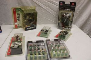 lot 110 image: Oakland Raiders figurines and mini action figures