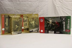 lot 114 image: Oakland Raiders figurines Brown, Moss, Gannon vs. Brooks
