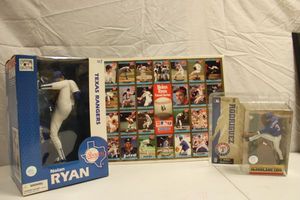 lot 115 image: Texas Rangers Figurines Nolan Ryan, A. Rodriguez and Nolan Ryan baseball cards