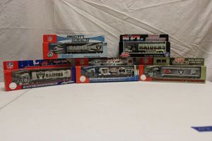 lot 117 image: Oakland Raiders 180 scale tractor trailers - 5 total