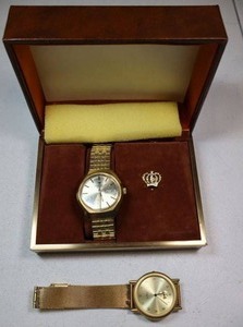 lot 151 image: Vintage gold tone watches with case