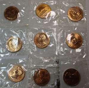 lot 165 image: Copper colored commemorative president coins