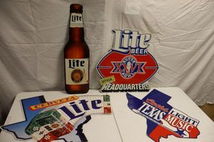 lot 126 image: Metal light beer and Texas beer signs