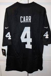 lot 130 image: Carr #4 jersey still has tags