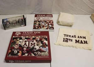 lot 132 image: Texas A&M lot ornaments, Books and towel