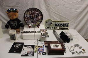 lot 144 image: Oakland Raiders collectors plate, teddy bear, wooden trinket box, pins and more