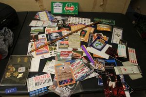 lot 147 image: Bud Bowl pins, autographed business cars #94, souvenir game tickets and stickers