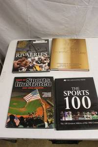 lot 193 image: Sports Illustrated books and the APs The Sports 100