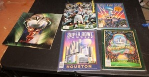 lot 199 image: Super Bowl magazines and Van Halen 5150 album