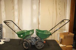 lot 210 image: Two rolling yard spreaders
