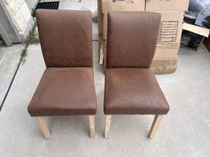 lot 235 image: Newly added...Faux brown leather dining chairs