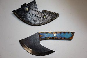 lot 245 image: 5 blade Ulu knife with leather sheath.  Blue wood grain handle.