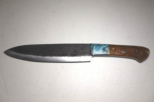 lot 259 image: 8 blade kitchen knife textured black top.  Multi medium handle.