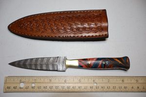 lot 268 image: 4 blade Dagger knife with leather sheath.  Resin handle.