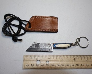 lot 32 image: Keychain mini cleaver with leather sheath