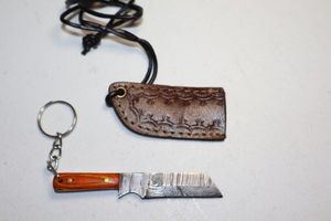 lot 35 image: Keychain mini reverse tanto knife