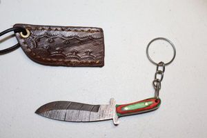 lot 41 image: Keychain mini Kukri knife with sheath