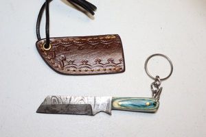 lot 43 image: Keychain straight knife or mini cleaver with sheath