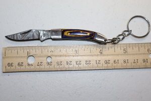lot 54 image: Keychain folding pocket knife