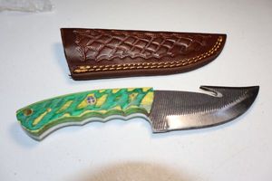 lot 68 image: Gut hook skinner knife with sheath