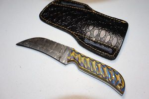 lot 79 image: Hawkbill or drop point knife with sheath