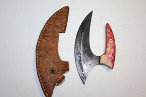 lot 105 image: Ulu knife with sheath