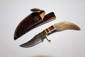 lot 122 image: Antler or bone handle knife with sheath